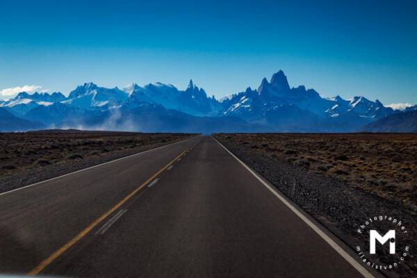 Road view in the front of big mountains