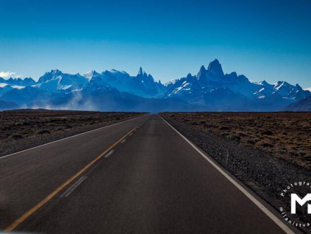 Road view in the front of big mountains