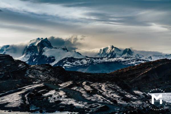 big mountains with clounds around