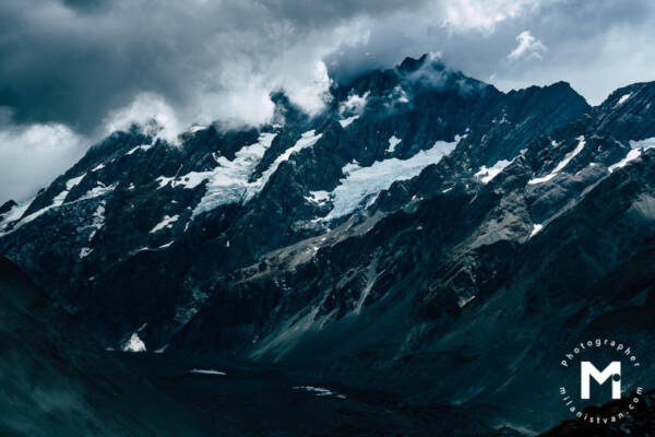 Big mountains with clouds front view