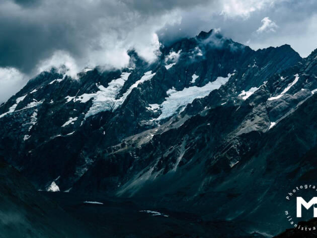 Big mountains with clouds front view