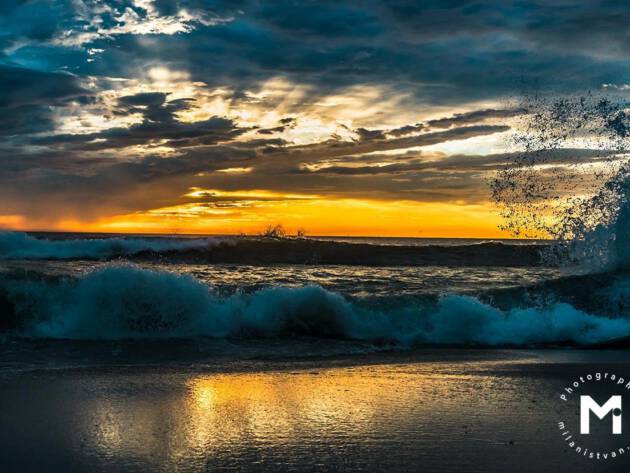 Sunrise with wave splash