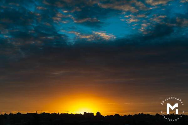 City sunset view with the blue sky at the top