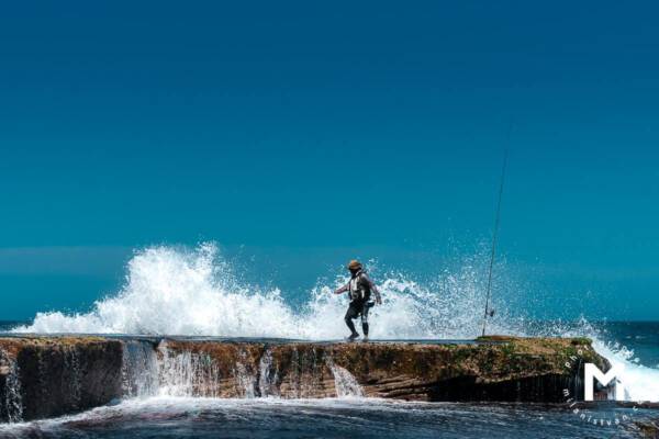 Fischer runs away from the wave