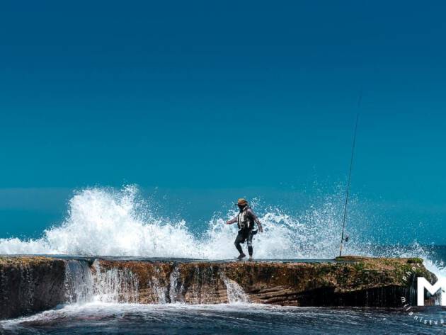 Fischer runs away from the wave