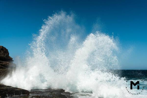 Ocean big splash against the rock