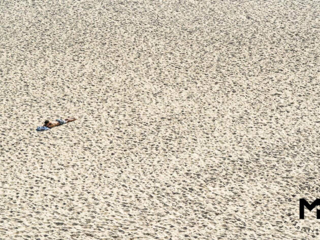 Man relaxing at the beach