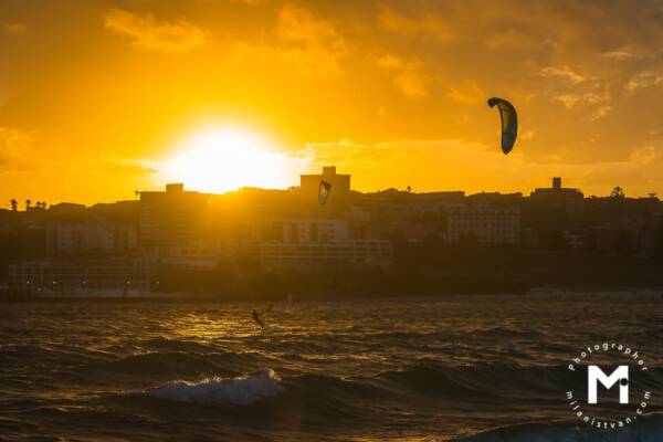 Kitesurfer at the sunrise