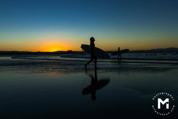 Surfer at the sunrise