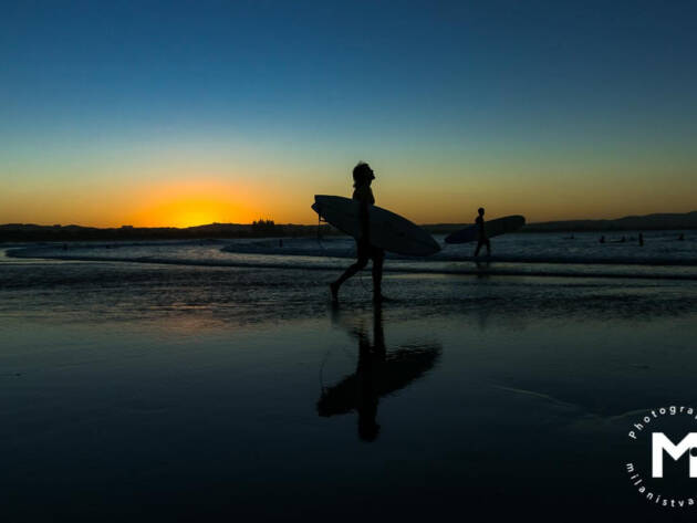 Surfer at the sunrise