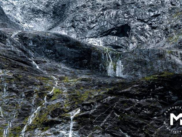 Nature metallic wall with small waterfalls