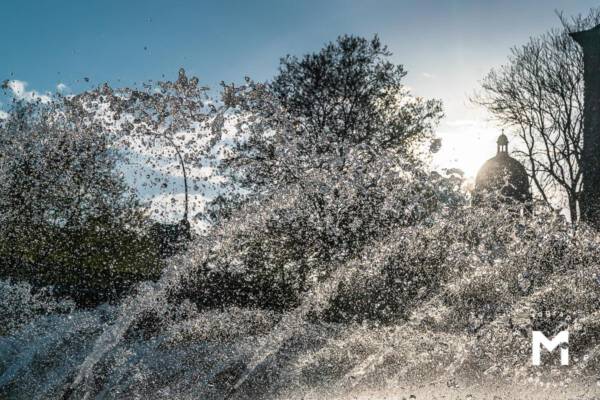 Big water fountain in the summer light